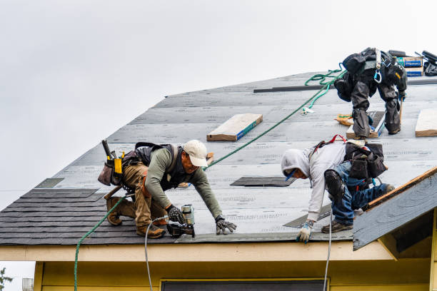 Professional Gutter Installation technician working in Woodinville, WA